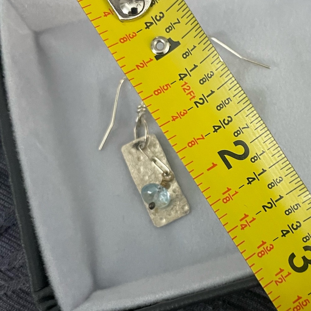 Sterling 1 3/4” earring with aquamarine stone. New in bag